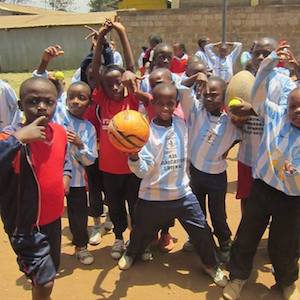 donated footballs at Forrester School